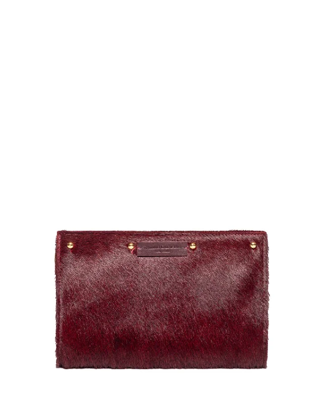 Lizzie Reversible Clutch Cover: Burgundy Hair on Hide to Black Suede